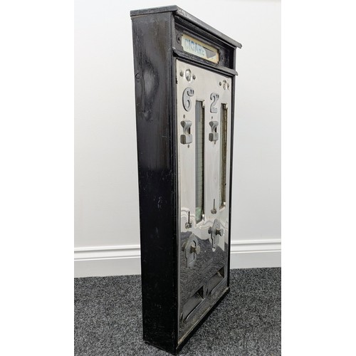 3003 - A rectangular chrome and black painted metal wall mounted cigarette dispenser/vending machine, milk ... 