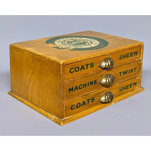 3018 - An early 20th century elm three draw shop counter display rectangular cotton reel box, J & P Coates,... 