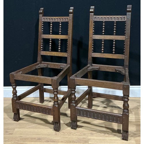 5 - A pair of oak spindle back dining chairs, number 79 by Nigel Griffiths Monastic Woodcraft, signed (2... 