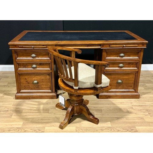 20 - A contemporary reclaimed hardwood twin pedestal desk, 82.5cm high, 174cm wide, 79.5cm deep; a confor... 