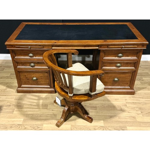 20 - A contemporary reclaimed hardwood twin pedestal desk, 82.5cm high, 174cm wide, 79.5cm deep; a confor... 