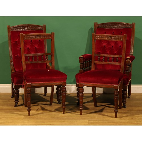 101 - A late Victorian/Edwardian mahogany four-piece salon suite, comprising ‘his and hers’ chairs and a p... 