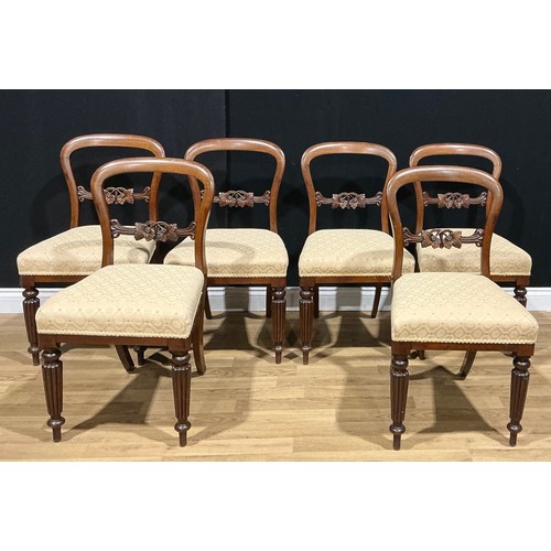 102 - A set of six Victorian mahogany dining chairs, each mid-rail carved with leaves, stuffed-over seat, ... 