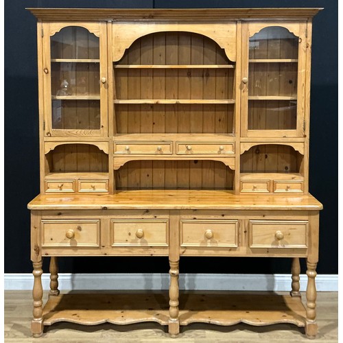 106 - A Victorian style pine dresser, 207cm high, 189cm wide, 46cm deep