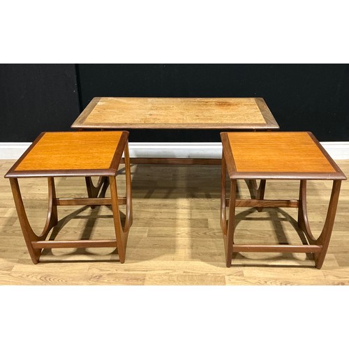 110 - A retro mid-20th century G Plan nesting coffee table, the largest 99cm wide
