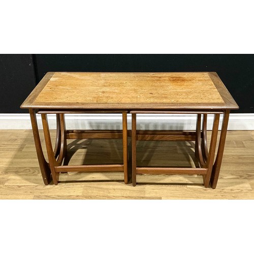 110 - A retro mid-20th century G Plan nesting coffee table, the largest 99cm wide