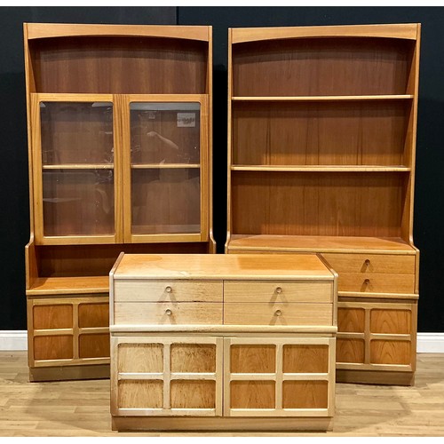 111 - A retro mid-20th century teak open library bookcase, by Nathan; another, similar, glazed; a low side... 