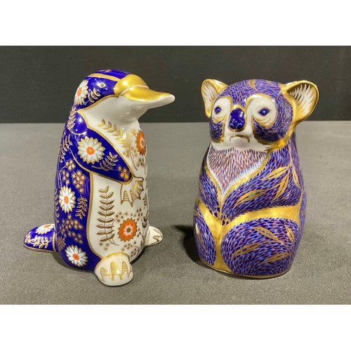 31 - A Royal Crown Derby paperweight, Koala, gold stopper, printed mark in red; another, Platypus, gold s... 