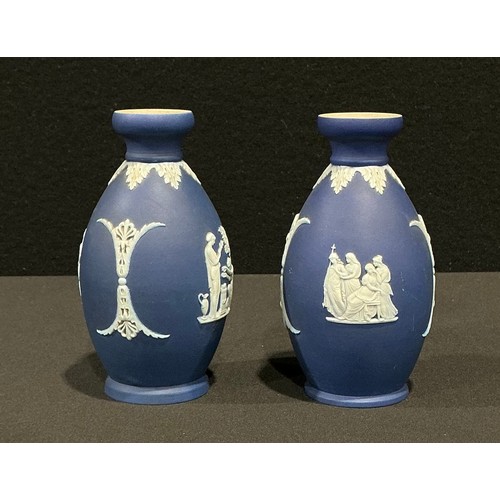 64 - A pair of late 19th century Wedgwood Jasperware ovoid vases, sprigged with figures from classical an... 