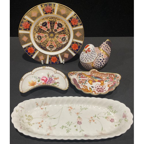 67 - A Royal Crown derby paperweight, Hen, gold stopper, printed mark in red; an 1128 pattern tea plate, ... 