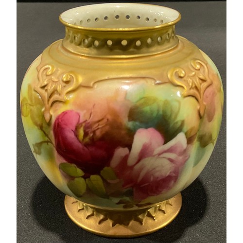 69 - A Royal Worcester lobed ovoid vase, painted with pink and red roses, pierced neck, moulded borders, ... 