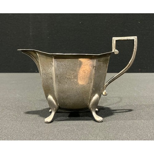 80 - A George VI silver milk jug, of octagonal panelled form, Viners, Sheffield 1939, 159.5g