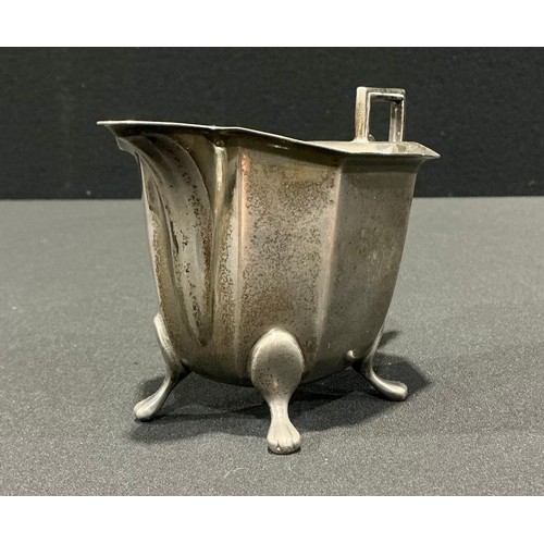80 - A George VI silver milk jug, of octagonal panelled form, Viners, Sheffield 1939, 159.5g