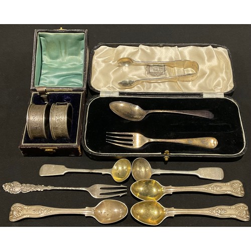 96 - A pair of Victorian silver napkin rings, 4.5 diameter overall, cased, Birmingham 1889; other silver,... 