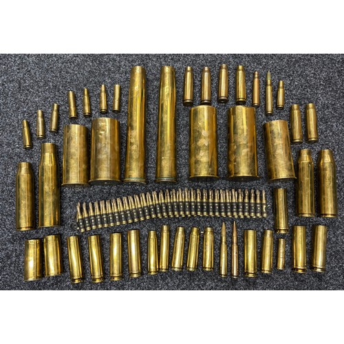 A quantity of various brass shell cases, to include WW1 Imperial German ...