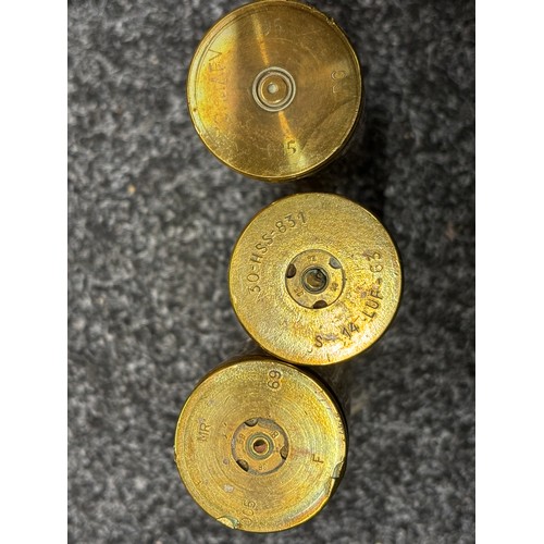 A quantity of various brass shell cases, to include WW1 Imperial German ...