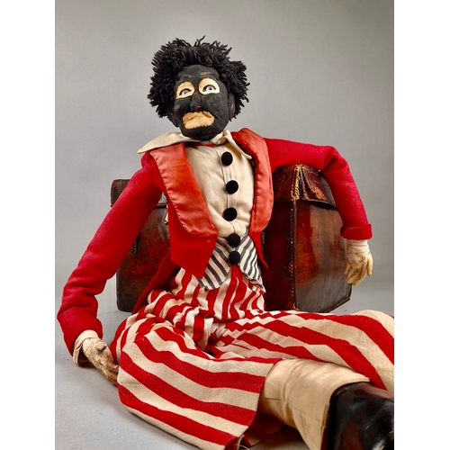 7344 - Juvenalia - a large 1920’s felt American Minstrel performer doll, approximately 100cm tall

This lot... 