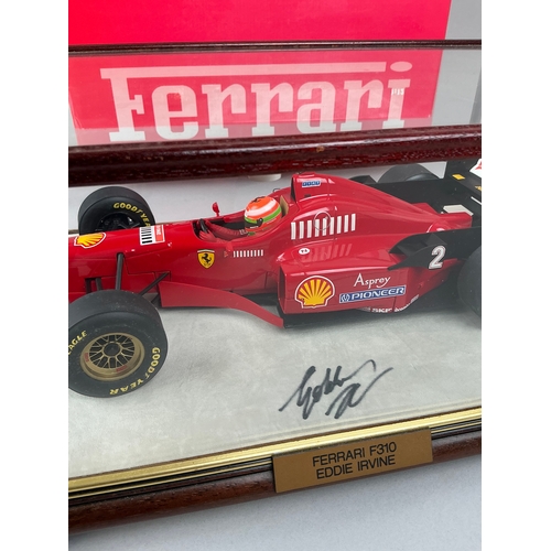7329 - Formula 1 - a well displayed Paul's Model Art 1/12 scale Ferrari F310 Eddie Irvine F1 racing car, in... 