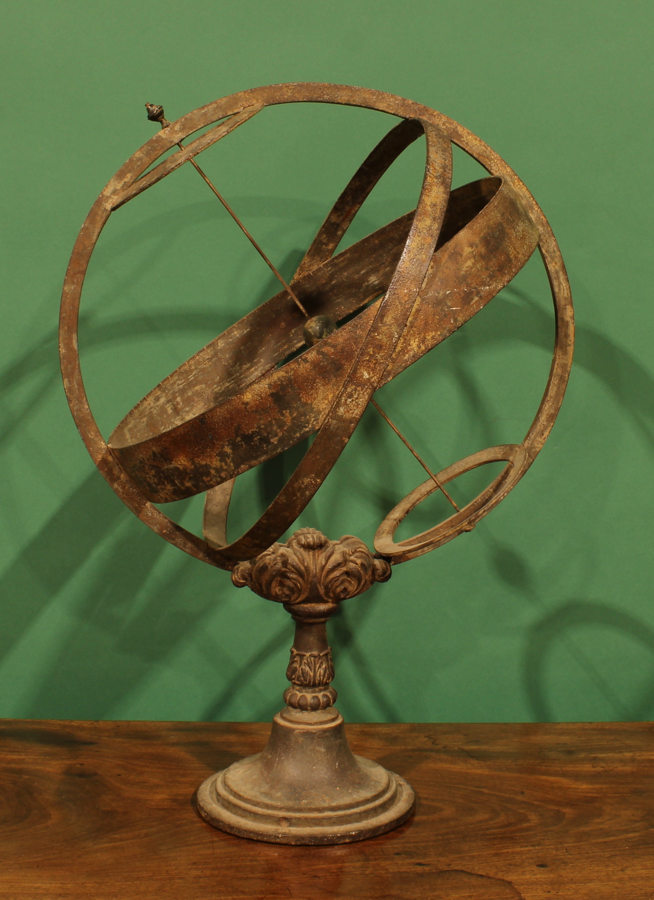 An early 20th century iron ‘armillary sphere’ sundial, 72cm high, 50 ...
