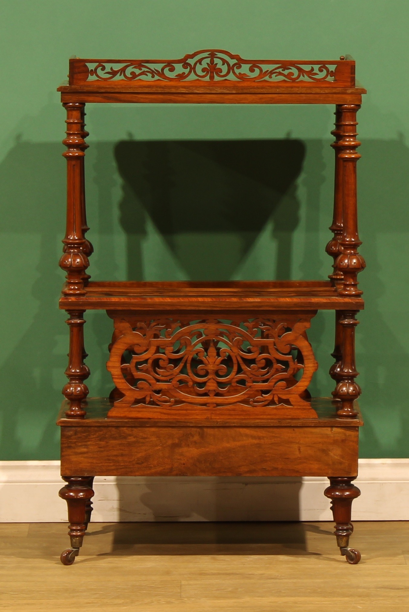 A Victorian walnut music room Canterbury whatnot, rounded rectangular ...