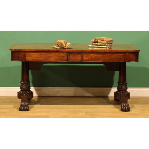 An early Victorian rosewood library table, rounded rectangular top ...