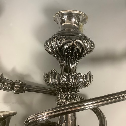 26 - A pair of 19th century Sheffield Plate candelabra branches, chased with acanthus, 47cm wide