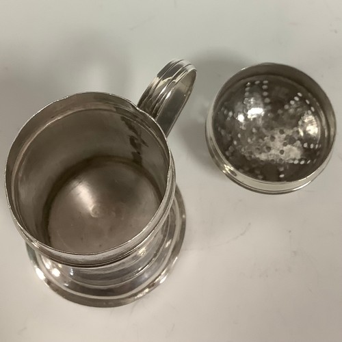 52 - A George II provincial silver bun top kitchen pepper, scroll handle, skirted base, 8cm high, John La... 