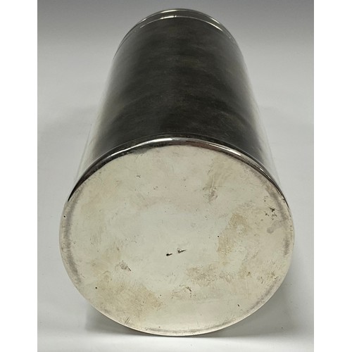 48 - An unusual Art Deco style E.P.N.S cocktail shaker, in relief with a boy playing football, 22cm high