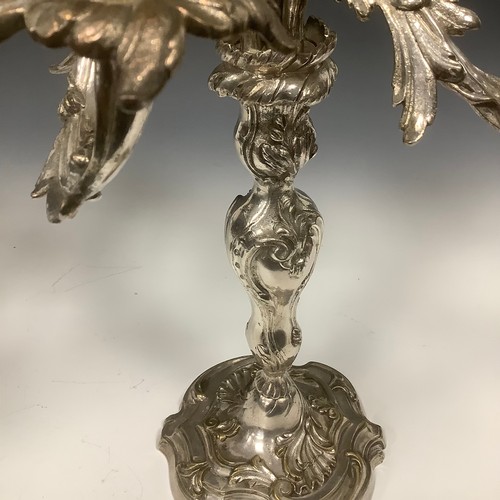 25 - A pair of 18th century style Rococo silver plated five-light table candelabra, cast throughout with ... 
