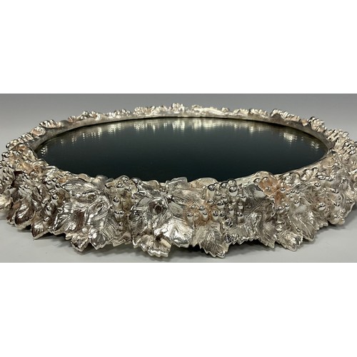 36 - A Victorian electrotype shaped circular cake plateau, fruiting vine border, 34cm diam, Thomas Bradbu... 