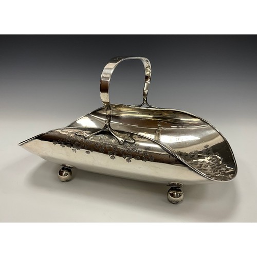 34 - A pair of late Victorian E.P.N.S trug-form baskets, bright-cut engraved with stiff leaves, ball feet... 