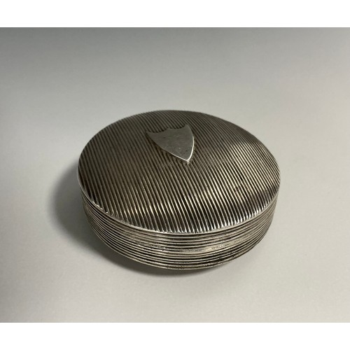 167 - A 19th century Dutch silver circular snuff or peppermint box, reeded overall, push-fitting cover cen... 