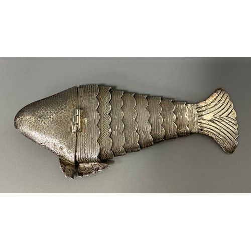 151 - A Continental silver novelty etui case, as an articulated fish, 12cm long, import marks for Chester ... 