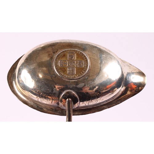 54 - A George II silver coloured metal toddy ladle, twisted baleen handle, 32.5cm long, apparently unmark... 