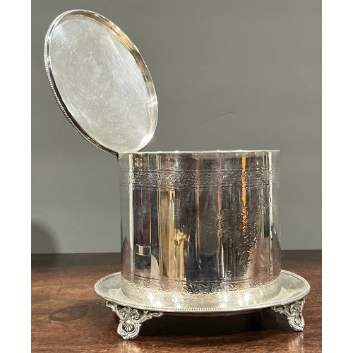37 - A Victorian silver cylindrical biscuit box, hinged cover, chased with bands of foliate scrolls, vaca... 