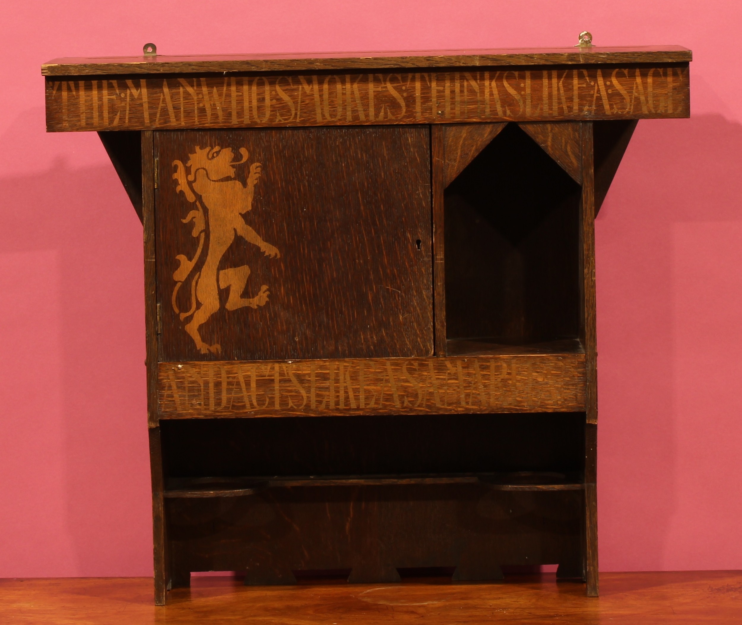 Liberty & Co - an Arts and Crafts wall hanging cabinet, oversailing ...