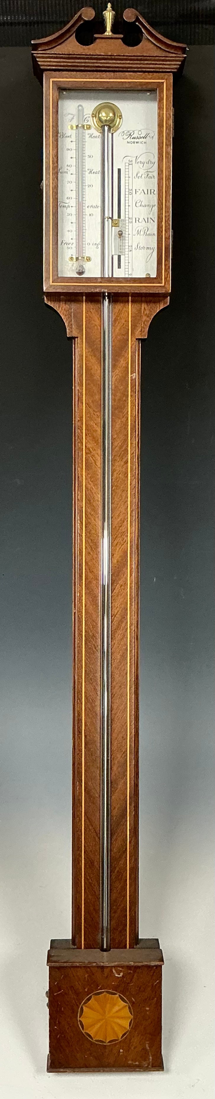 A Russell, Norwich inlaid mahogany stick barometer, silvered scale with ...
