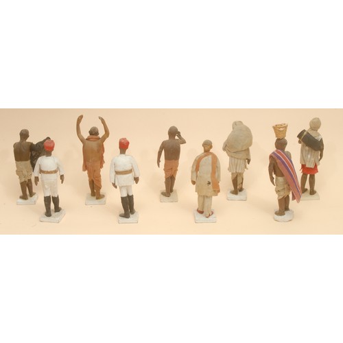 3928 - Style of Jadunath Pal (c.1821-1920), a collection of nine Indian clay figures, each modelled as a na... 