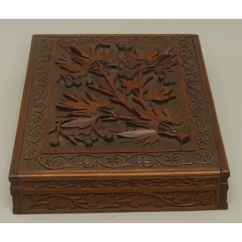 3590 - An Anglo-Indian Kashmiri hardwood rectangular armorial cigar box, hinged cover carved in bold relief... 