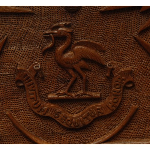 3590 - An Anglo-Indian Kashmiri hardwood rectangular armorial cigar box, hinged cover carved in bold relief... 