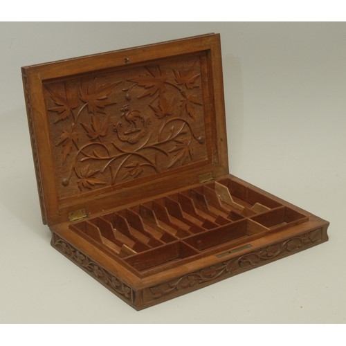 3590 - An Anglo-Indian Kashmiri hardwood rectangular armorial cigar box, hinged cover carved in bold relief... 