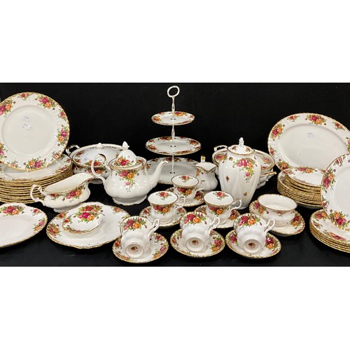 122 - Royal Albert Old Country Roses dinner service comprised of, sandwich platter, three tier cake stand,... 