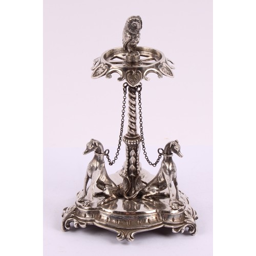 51 - A Victorian silver plated table centre, in the manner of Elkington & Co., owl finial above a c-scrol... 