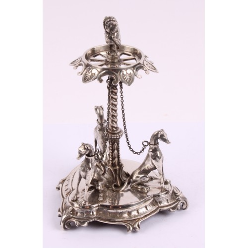 51 - A Victorian silver plated table centre, in the manner of Elkington & Co., owl finial above a c-scrol... 