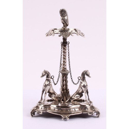 51 - A Victorian silver plated table centre, in the manner of Elkington & Co., owl finial above a c-scrol... 