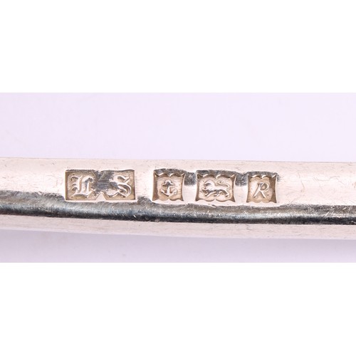 25 - A collection of silver teaspoons, various dates and makers; a pair of sugar bows; an Arts & Crafts s... 