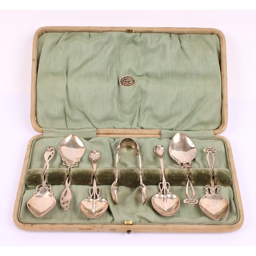 7 - A set of six Art Nouveau silver tea and patisserie spoons, spade and heart shaped bowls, sinuous ste... 