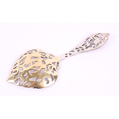 15 - A Victorian silver bon bon spoon, gilt heart shaped bowl, pierced and cast with a putto and scrollin... 