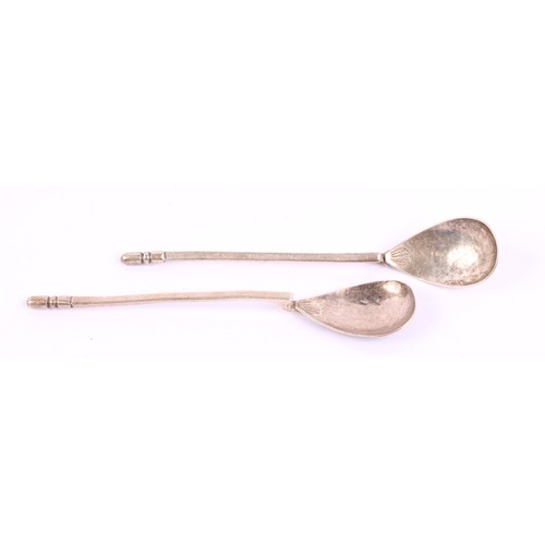 19 - Keswick School of Industrial Arts - a pair of Arts and Crafts silver spoons, planished pear shaped b... 