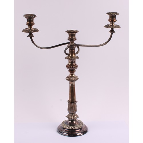 47 - A silver on copper two branch metamorphic table candlestick, pair of detachable sconces, the support... 